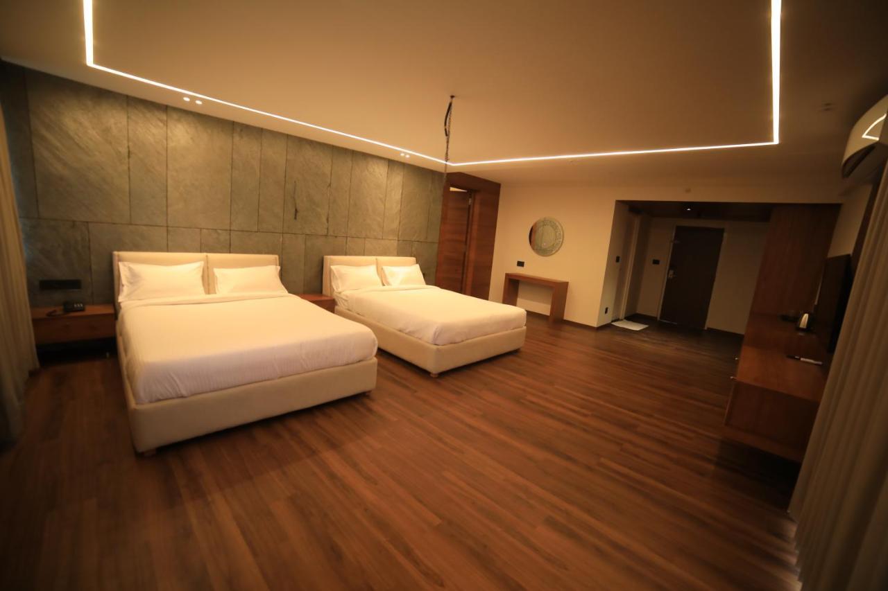 Hotel Bekal International คาซารากอด ภายนอก รูปภาพ