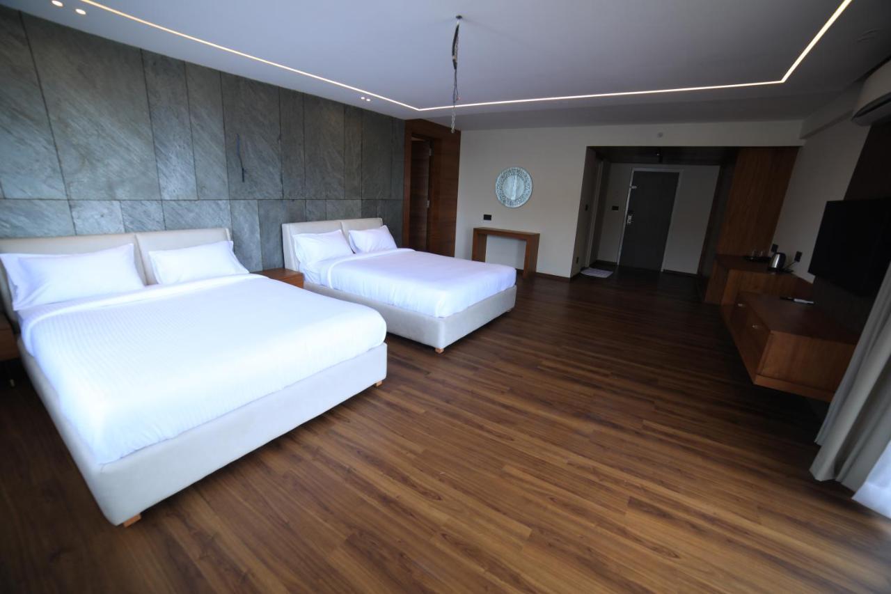 Hotel Bekal International คาซารากอด ภายนอก รูปภาพ